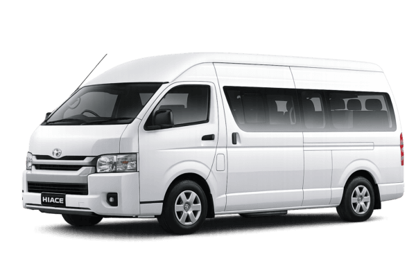 Toyota Hiace Commuter Luxury putih tampak serong depan dan samping untuk layanan sewa Hiace Luxury Tangerang dengan driver profesional